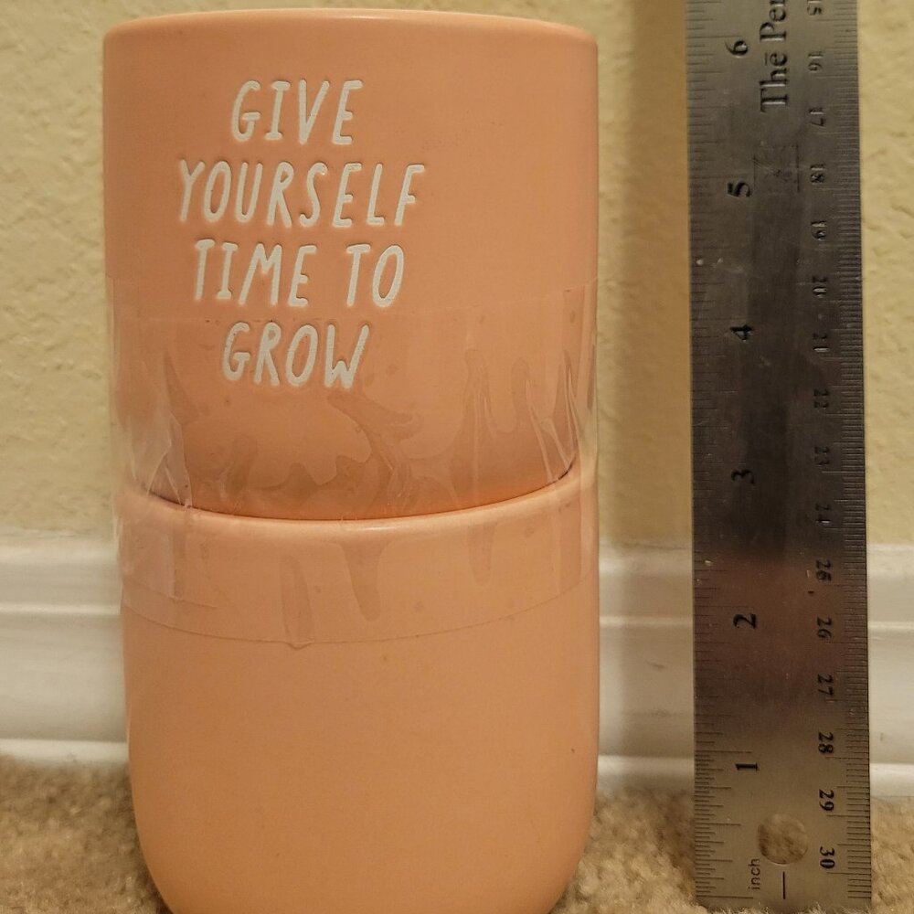 Two (2) Small Peach-Colored “Give Yourself Time to Grow” Pots